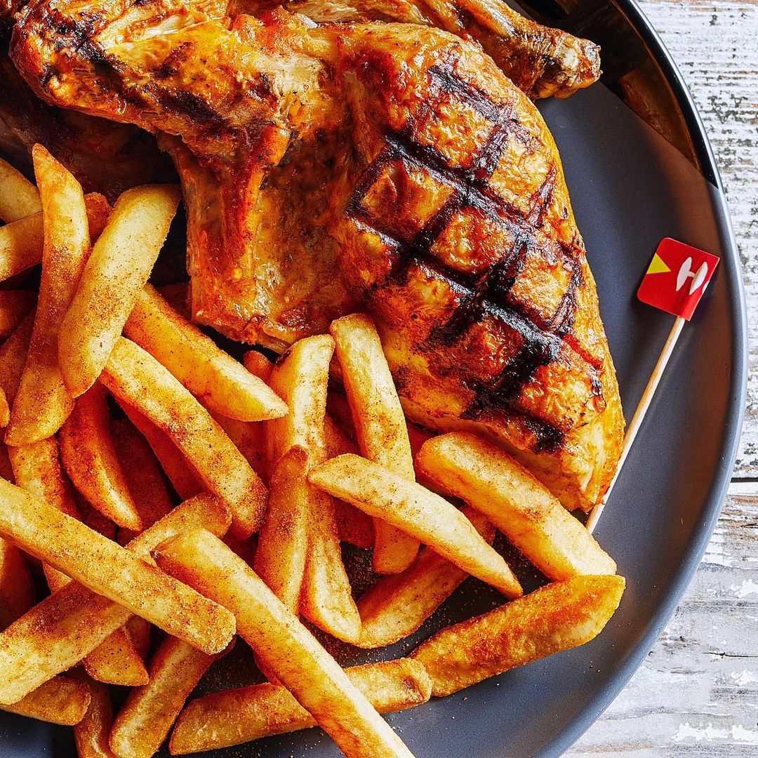 Nando's chicken and chips on a plate
